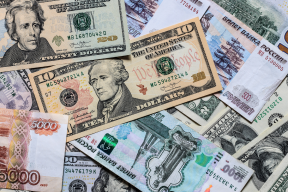 Курс доллара впервые с 12 марта опустился до 91 рубля